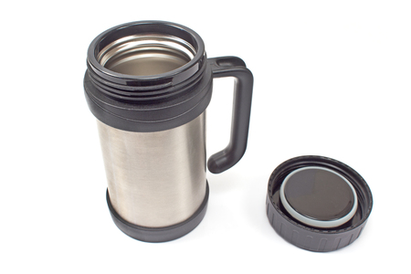 Thermos flask mug with lid isolated on whiteの写真素材