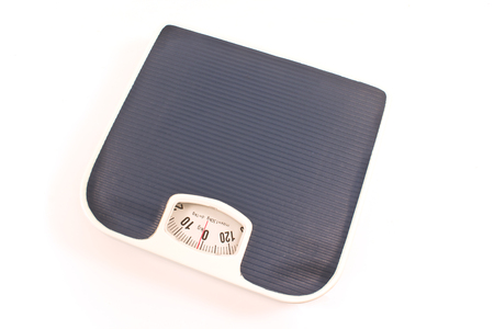Weight bathroom scale isolated on whiteの写真素材
