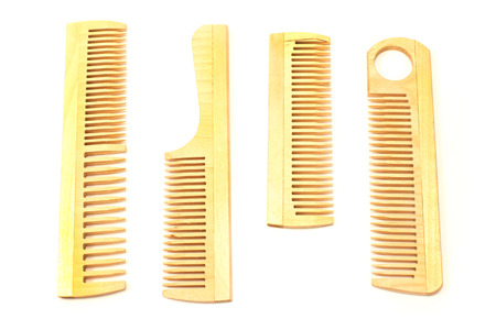 Wooden combs isolated on white background