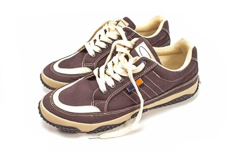 Sneakers in navy color isolated on whiteの写真素材