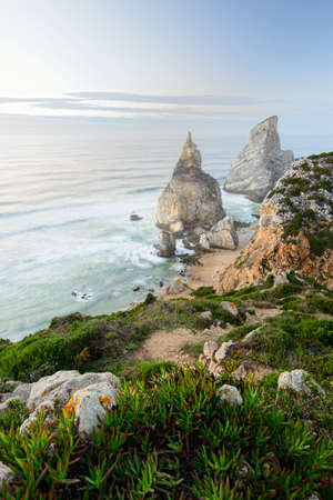 Amazing nature: coastline, rocks and sea waves.  Portugal, Sintra, Cabo da Roca, Praia da Ursa, Ursaの写真素材