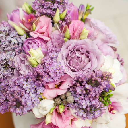 flower composition with lilac and eustoma flowersの写真素材