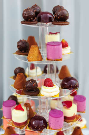 Tasty cookies and sweet desserts on the plate for the birthday, event or weddingの写真素材