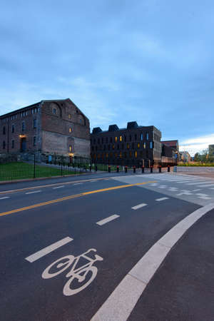 Bicycle lane signage on street in Norwegian city. Eveningの写真素材
