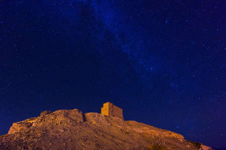 Night view from Ait Ben Haddou, Atlas mountains, Africa. Starry night sky.の写真素材