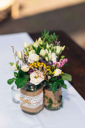 Beautiful flower decorations with candles for the wedding ceremony.の写真素材