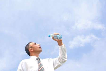 sweet restorative water slake thirst be tired businessmanの写真素材