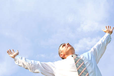 free fly   successful businessman upon background beautiful cloud blue heaven の写真素材