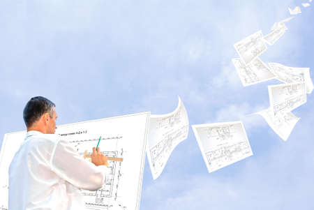 serious engineer-designing resolve compound architectural problemの写真素材