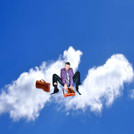 businessman calculate finance liability and dreams of gross fortuneの写真素材