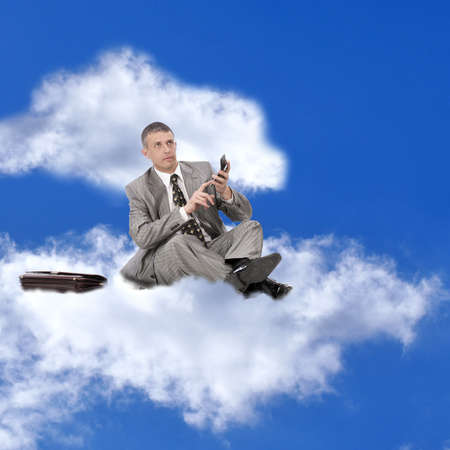 The successful businessman considers financial profit on financial investmentsの写真素材