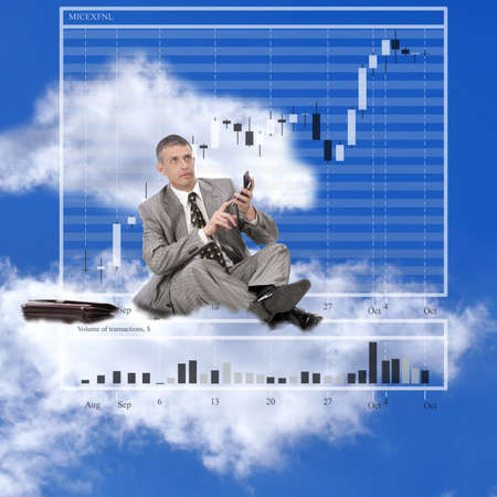 The successful businessman considers financial profit on financial investmentsの写真素材