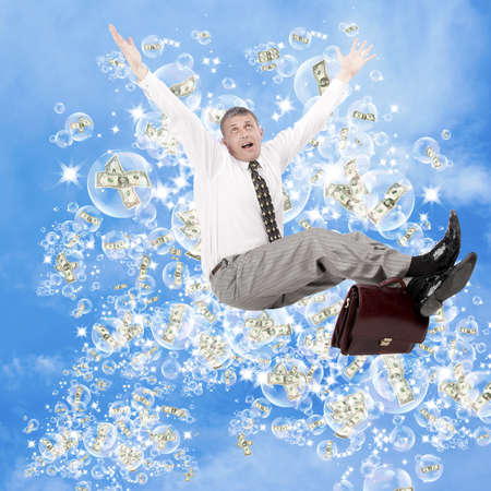 The successful businessman dreams of the big financial profit on investmentsの写真素材