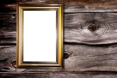 Decorative frame for a photo  on a old wooden backgroundの写真素材