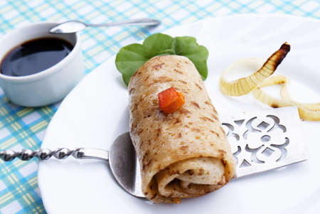 Appetizing baked pancakes with meat の写真素材