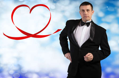 Men in Tuxedo looking at the camera Love Concept Valentine Dayの写真素材