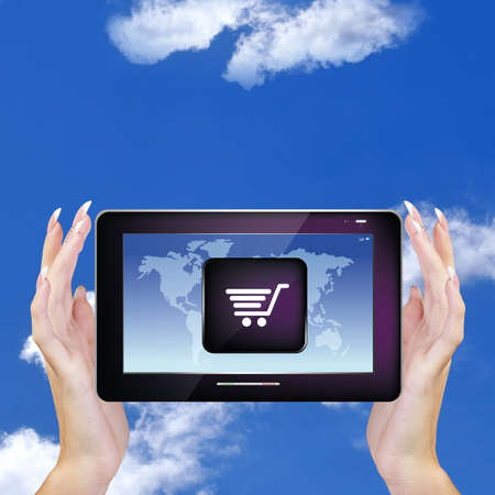 Digital Tablet in woman Hands on sky blue background E-commerce Internet
