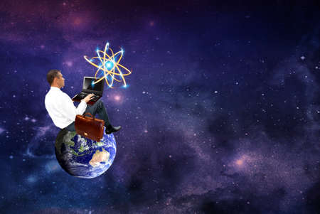Man using laptop in space