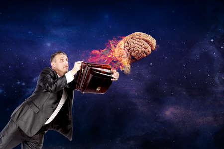 Creativity ideas. businessman witch open portfolioの写真素材