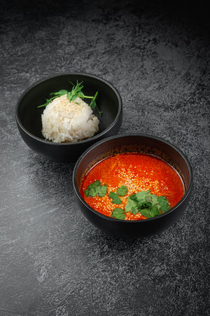Thai tom yum soup with riceの写真素材