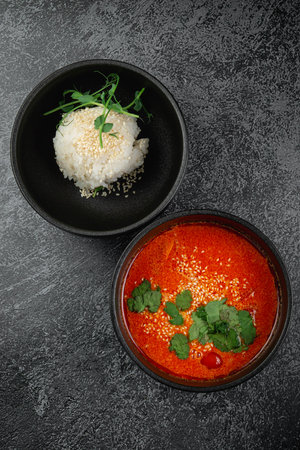 Thai tom yum soup with riceの写真素材