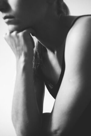 girl thinking, putting her chin on hand