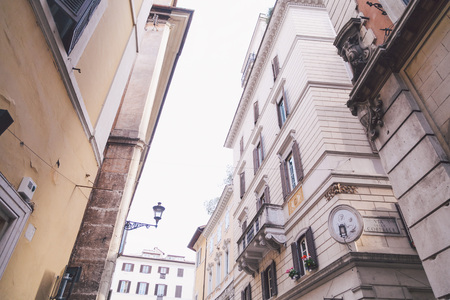 narrow street crossroad in Romeの写真素材