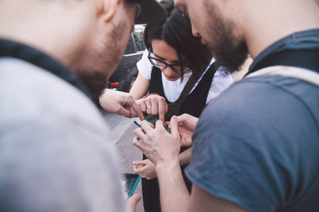 friends deciding where to goの写真素材