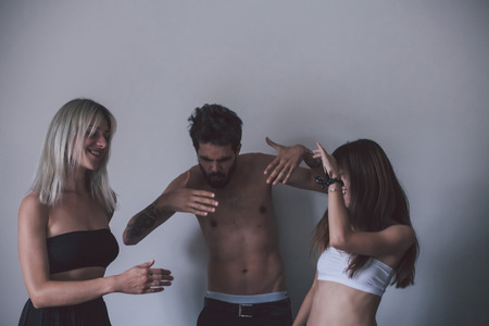 girl and boy hugging on white backgroundの写真素材