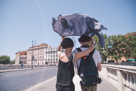 girl and boy walking on the street in Romeのeditorial素材