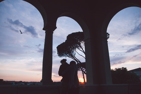 silhouette of lovers in Romeの写真素材