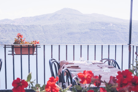 cafe with a view on the mountains in Romeの写真素材