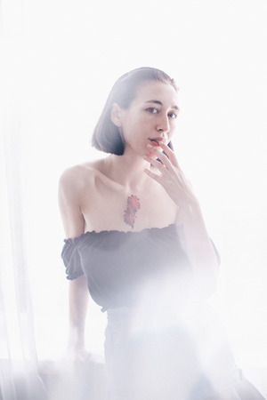 beautiful girl in sunlightの写真素材