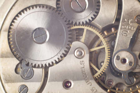 Old clock with machinery in sight