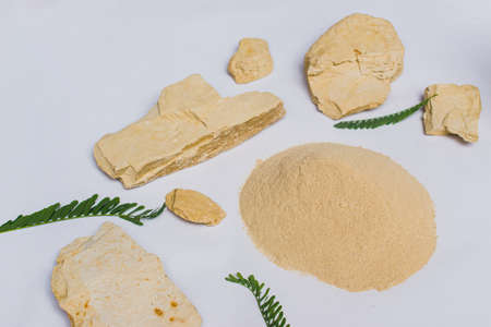 organic dry clay powder on white background. natural clay powder for cosmetic industry, spa or home useの写真素材