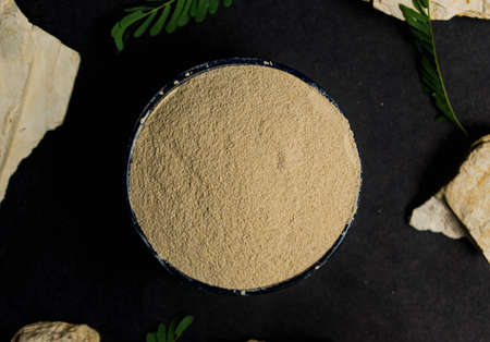 organic dry clay powder on white background. natural clay powder for cosmetic industry, spa or home useの写真素材