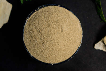 organic dry clay powder on white background. natural clay powder for cosmetic industry, spa or home useの写真素材
