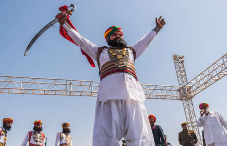 Jaisalmer, Rajasthan, India - 02 27 2021: Participants of Mr Desert completion on stage in the desert festivalのeditorial素材