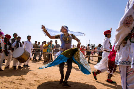 Jaisalmer, Rajasthan, India - 02 27 2021: local woman dancer dances on in the desert festivalのeditorial素材