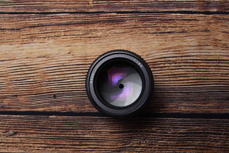 magnifying glass on wood backgroundの写真素材