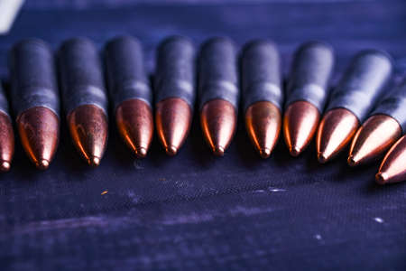 Copy space rifle cartridges are in a row. Self-defense conceptの写真素材