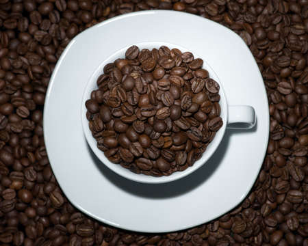 Coffee beans and a glass of