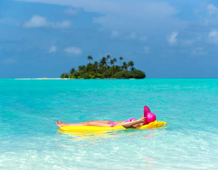 Woman on an air mattress
