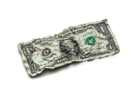 Crumpled dollar bills isolated on white backgroundの写真素材