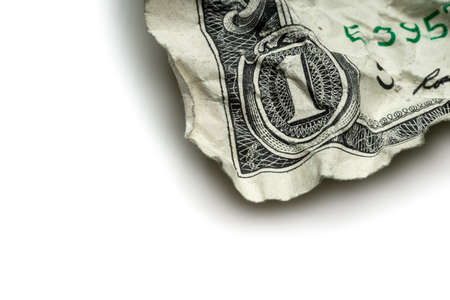 Crumpled dollar bills isolated on white backgroundの写真素材