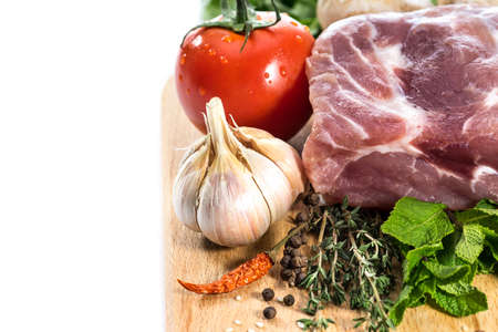 Food  Raw Meat for barbecue with fresh Vegetables and Mushrooms on wooden surface  Meat Raw Steak and spices for cooking meat の写真素材