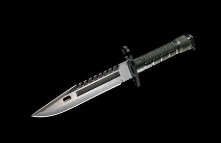 Black military knife on black backgroundの写真素材