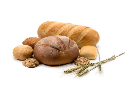 assortment of baked bread in basket on white backgroundの写真素材