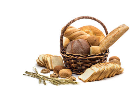assortment of baked bread in basket on white backgroundの写真素材
