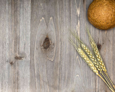 bread on a wooden backgroundの写真素材